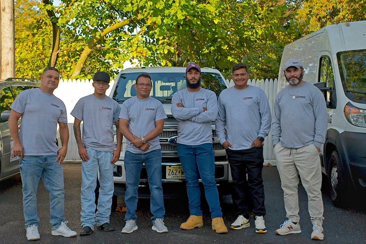 Antonio Pessi with the Pessi Construction team